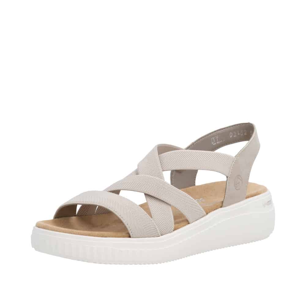 Remonte sandal til dame i beige med elastik rem samt ekstra bredde H og kilehæl på 4,5 cm